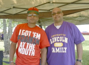 Warren Jones, left, and Lincoln High School Class of 1984 graduate Reao Keller at the Port Arthur Alumni Picnic on Pleasure Island on Saturday.