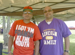 Warren Jones, left, and Lincoln High School Class of 1984 graduate Reao Keller at the Port Arthur Alumni Picnic on Pleasure Island on Saturday.