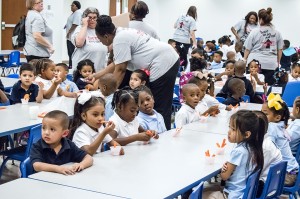 Wheatley School of Early Childhood students end their first day of the new school year munching carrots during snack time in the cafeteria Monday in Port Arthur.