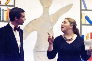 Alex Savoie, playing Baxter Mallenstock, left, and Haleigh Courts, playing Mimi Sheraton, rehearse a scene from the musical “Bullets for Broadway” during a dress rehearsal at the Port Arthur Little Theatre Wednesday.