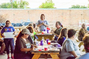 Mandy Clayton, Relay for Life of Mid- and South Jefferson County event co-lead, center, walks through ideas for Relay’s first year on Boston Avenue in April during the 2016 Retro Relay Kickoff meeting Tuesday night at the Nederland Heritage Festival Pavilion.