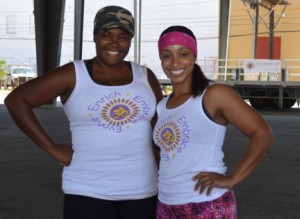 Kisha Simmons Proctor, left, and Genese Galvan, owners of E3Retreats, pose for a quick photo before a family fitness day at the pavilion in Port Arthur on Saturday. Mary Meaux/The News