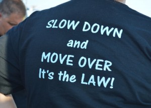 Darla Socia, wife of Joey Socia, a tow truck driver with Brian’s Wrecker Service, sports a shirt promoting safety awareness on Wednesday. Mary Meaux/The News