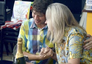 Chance Henson, left, shares an emotional moment with Sandra Hammerling while celebrating the Supreme CourtÕs ruling on same sex marriage at TacoÕs La Bamba on Calder Avenue in Beaumont on Friday.