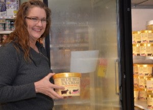 Kerrie Hilton was happy to see Blue Bell ice cream back in area stores. Hilton picked up some Blue Bell at Bruce’s Market Basket in Groves on Monday. Mary Meaux/The News 