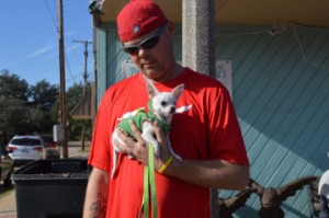 Ronnie Irion and his rescue dog, Piper, pose for a photo during Christmas on the Avenue in Nederland on Saturday. Mary Meaux/The News