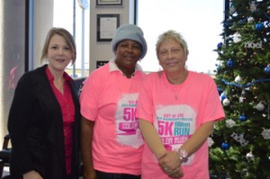 Gift of Life Program Services Manager Christina Morris, left, poses for a photo with breast cancer survivors Ernestine Anderson of Sour Lake, and Lori Odom of Vidor at Philpott Motors in Nederland on Tuesday. Mary Meaux/The News