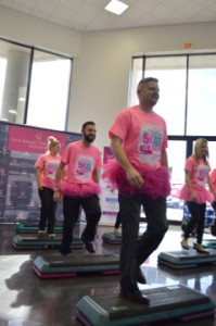 Philpott Motors employees don pink as they Step Up to Cancer by collectively taking 5,405 steps reflective of their contribution to the Gift of Life on Tuesday. Mary Meaux/The News