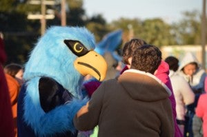 The Lamar State College-Port Arthur mascot dances with friends at a Mardi Gras Kick-off Party outside the Carl Parker Center in Port Arthur on Thursday. Mary Meaux/The News 