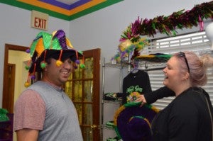 Ben and Samantha Murillo pick up some Mardi Gras essentials at the Mardi Gras Store in Port Arthur. Mary Meaux/The News 