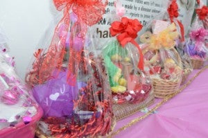 Valentine’s baskets, made by Chrissy Pelatan, are lined up and ready at Pelatan’s stand in the 2700 block of Memorial Boulevard on Saturday. 