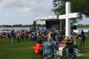 Crowds begin to gather at the entertainment stage area for Faith and Family Night of Port Neches RiverFest on Wednesday. Mary Meaux/The News