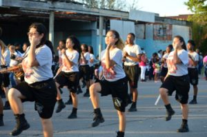Memorial High School’s Marching Heat high-steps down Procter Street during the Memorial High School Homecoming Parade on Wednesday. Mary Meaux/The News