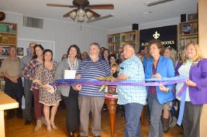Fleur Fine Books held a ribbon cutting celebrating their grand opening along with members of the Port Neches and Port Arthur chambers of commerce on Wednesday. Mary Meaux/The News