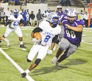 Port Neches-Groves junior defensive lineman Sergio Ayala tracks down Fort Bend Willowridge quarterback Kealton Goffney Friday evening. (Gabriel Pruett/The News)