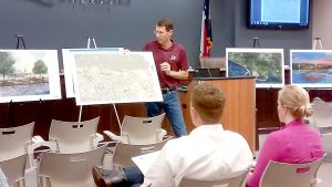 Bill Worsham, director of Coastal Engineering, shows different development scenarios for the riverfront in Port Neches during the Port Neches Riverfront Planning and Design Public Input Meeting at city hall in August.
