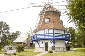 A historical marker in front of the Dutch Windmill Museum pays homage to Nederland’s first settlers. (Mary Meaux/The News)