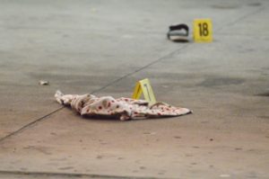 Placards mark evidence after a shooting at Raceway, 2705 Memorial Blvd. on Wednesday night. Gabriel Pruett/The News