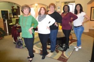 Swingsters through the eras — Anne Boutte, the first captain of the Thomas Jefferson Swingsters, class of 1965, left, Cyndi Puckett Thomas, class of 1975, Karen Keith LeBouef, class of 1981, Erna Jones, class of 1994, and Heather Meaux, class of 2001. Mary Meaux/The News