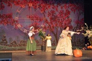 The fairy godmother casts a spell onstage for Cinderella at NHS Performing Arts Center. (Lorenzo Salinas/The News)