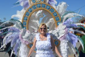 “Diamond Princess” Cynthia Hinds smiles for the camera at the Royalty March. (Lorenzo Salinas/The News)