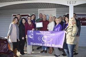 Jon and Rachel Carona, center, of Advantage Real Estate, were honored as the Business of the Month by Port Neches Chamber of Commerce on Thursday. Mary Meaux/The News