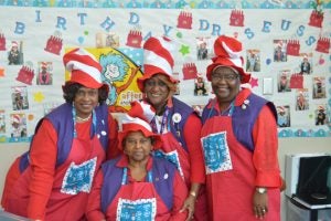 (From left) Sherold Alpough, Margaret Foreman, Barbara Bryant and Jodie Scott are some of the members of the AARP Experience Corps that tutor children in literacy skills. (Lorenzo Salinas/The News)