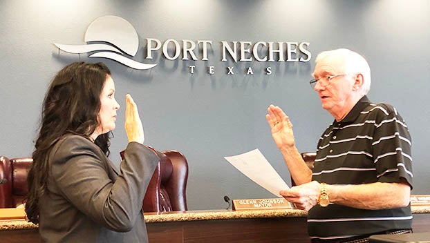 Port Neches Mayor Glenn Johnson swears in new Police Chief Cheri Griffith Thursday. (Monique Batson/The News)